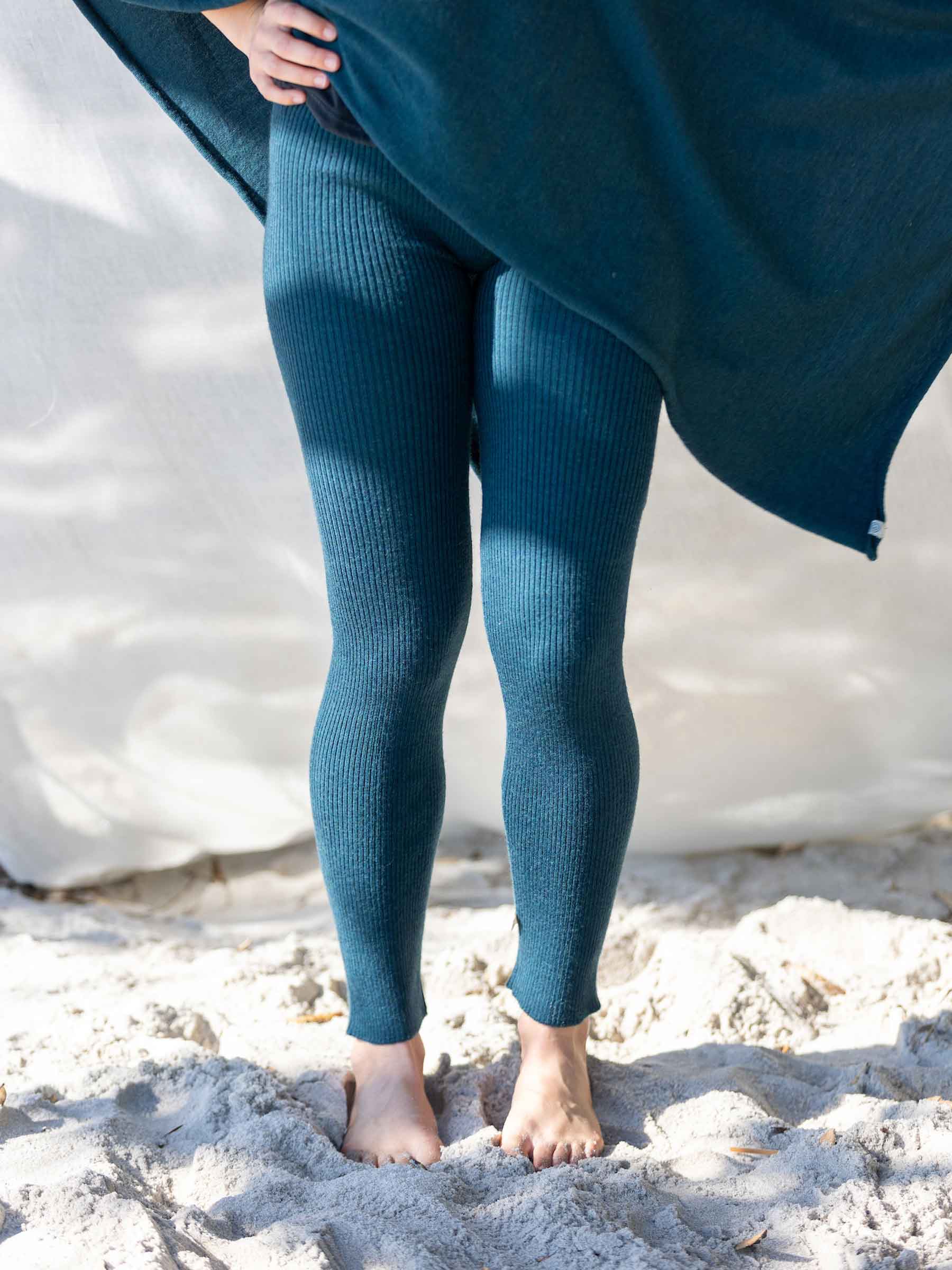 Nui Organics Women's Knit Leggings in Teal — close-up of teal rib knit merino wool leggings showing texture and full ankle length